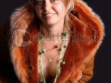 stock-photo-russian-girl-in-fur-on-black-background-7230835.jpg