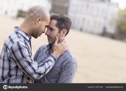 depositphotos_187577436-stock-photo-young-gay-couple-embracing-each.jpg