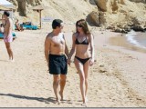 nicolas-sarkozy-and-bikini-clad-girlfriend-carla-bruni-at-luxor-beach22.jpg