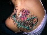 female_tattoo_with_japanese_koi_fish_tattoo_3.jpg