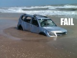 driving-fail-car-stuck-sand-beach.jpg