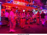 nightlife-soi-cowboy-red-light-district-girls-standing-outside-bar-fcxtb8.jpg