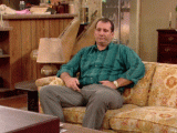 Al-Bundy-Bored-At-Home-Switching-The-TV-Channel-On-Married-With-Children.gif