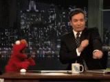 jimmy-fallon-elmo-happy-dance-saturday-night-live.gif