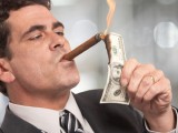 Rich-HNWI-billionaire-lighting-cigar-Shutterstock-740x360.jpg