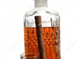 depositphotos_134681734-stock-photo-decanter-of-whiskey-and-cigar.jpg