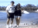 couple-waterfront-pose-fail.gif