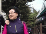 funny-asian-lady-scared-of-black-iron-man.gif
