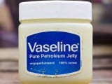 depositphotos_228029498-stock-photo-plastic-jar-vaseline-blue-sticker.jpg