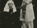 illusionist-magic-show-by-pharos-with-fake-decapitation-date-circa-1900s-MHNXET.jpg