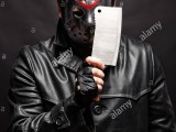 serial-murderer-with-knife-on-black-background-HGBYMR.jpg