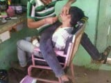 This barber, committed to giving a close shave_.jpeg