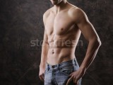 3178752_stock-photo-trained-body-wearing-demim.jpg