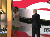 melania-trump-donald-trump-hug-6cabd580-7ab6-42d7-81d2-99810ec6ca68.gif