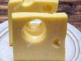 Emmentaler-cheese-with-big-holes.jpg