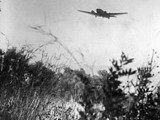 408px-Junkers_Ju_52_troop_carrying_aircraft_flying_low_over_the_island.jpg