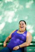 portrait-fat-woman-looking-camera-smiling-overweight-hispanic-42243996.jpg