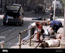 dead-and-wounded-people-lie-outside-of-sarajevos-city-indoor-market-after-a-mortar-shell-explo...jpg